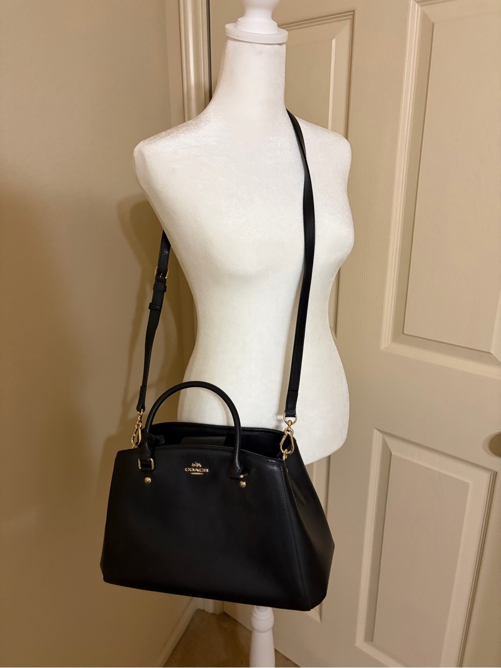 Coach Black Leather Satchel with Gold-Tone Hardware and Crossbody Strap